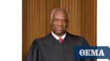 Supreme Court Justice Clarence Thomas,