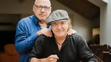 Brian Johnson-Mark Knopfler, Πρωταγωνιστούν,Brian Johnson-Mark Knopfler, protagonistoun