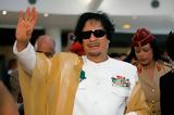 Muammar Gaddafi,