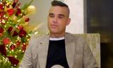 Robbie Williams, Δεν,Robbie Williams, den