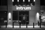 Intrum,